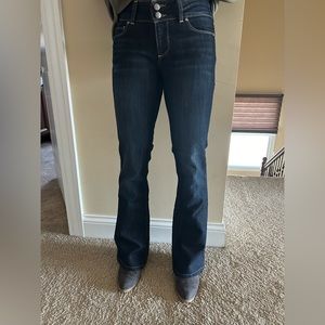 Paige Boot cut double button jeans. Great fit & paired well with heels